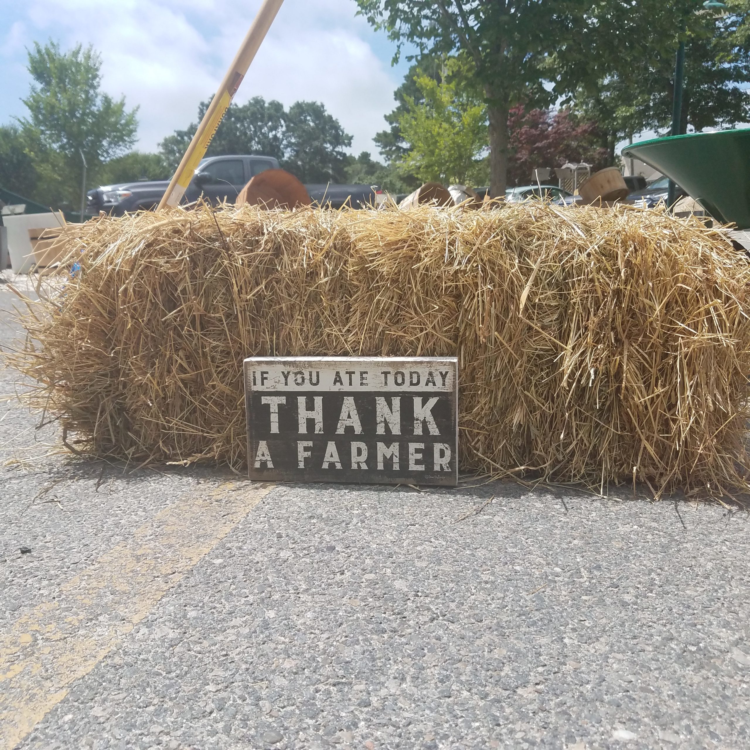 If you ate today, thank a farmer plack against hay and pitchfork
