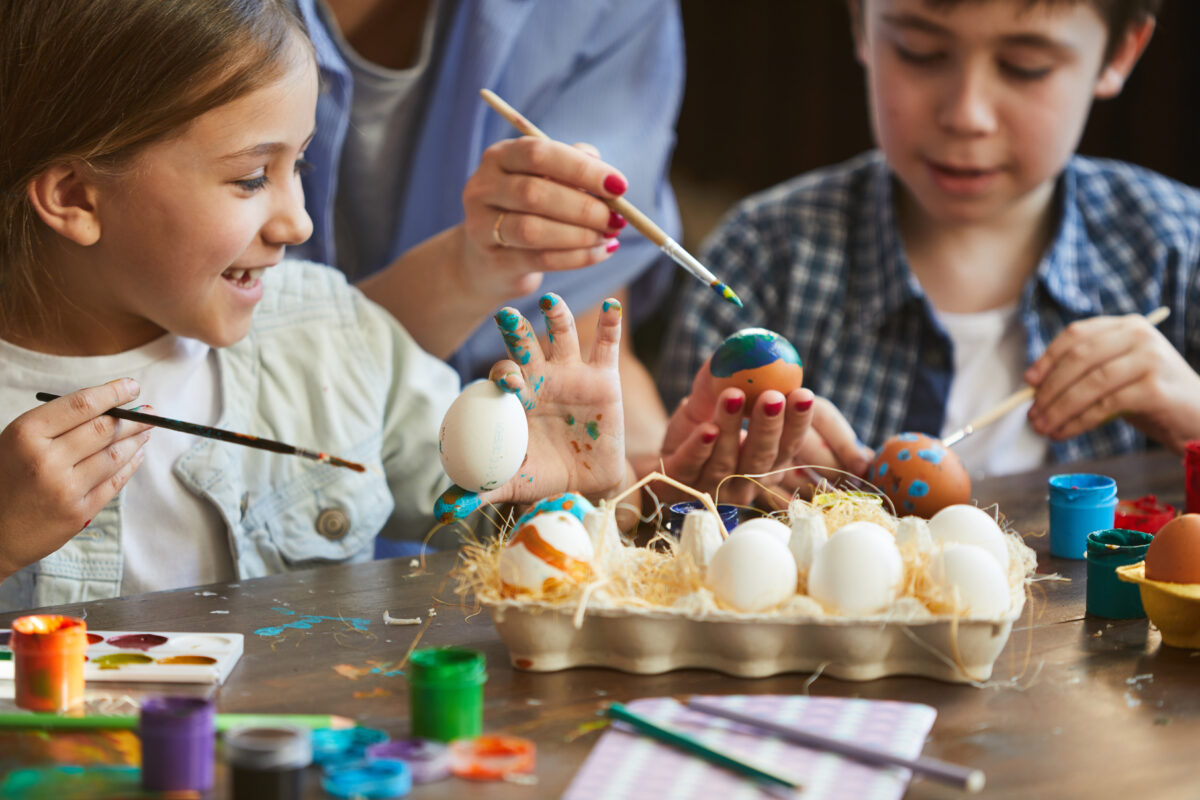 Two Kids Painting Easter Eggs