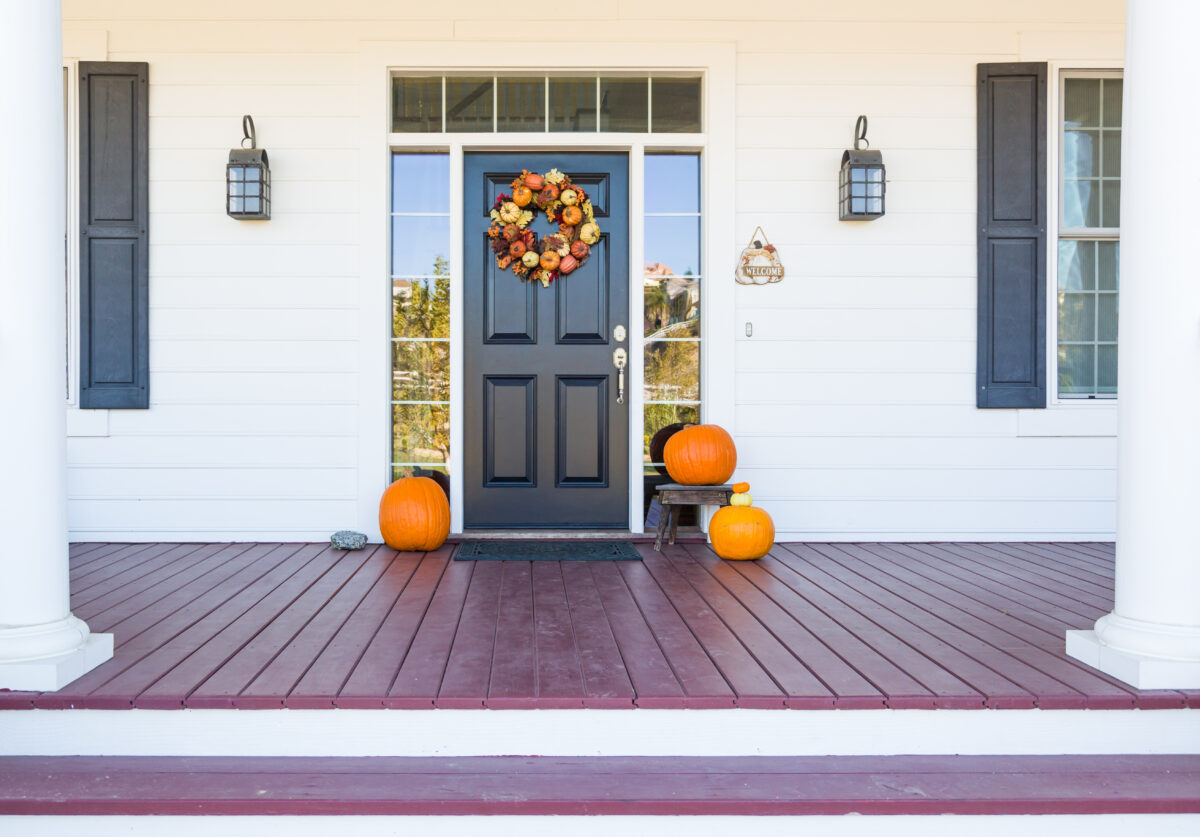 Fall Decoration Adorns Beautiful Entry Way To Home.